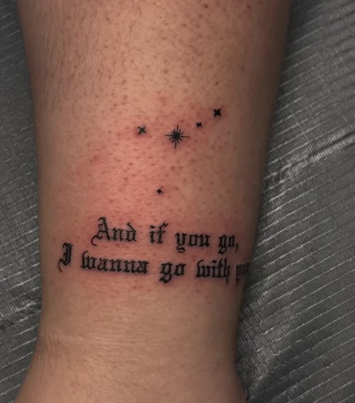 Close-up of clean fine line script lettering and stars tattooed by Justin at Final Touch Tattoo San Antonio